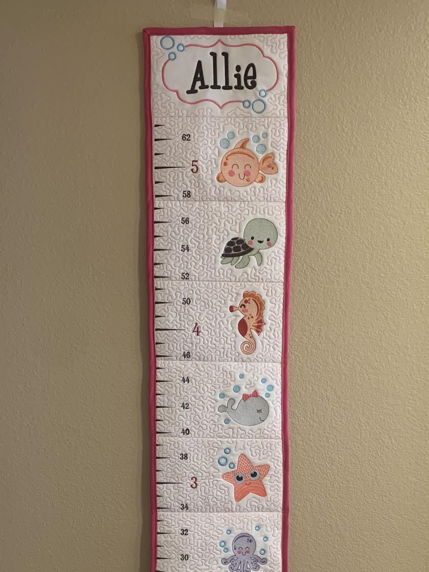 🐠💙 Watch Them Grow in Style! 💙🐠 This adorable under-the-sea growth chart is handmade and personalized just for your